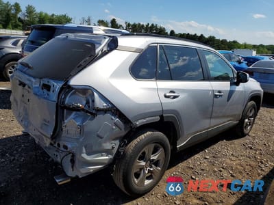 Trzecie zdjęcie samochodu z tyłu: 2023 TOYOTA RAV4 XLE VIN:2T3P1RFV7PC382988 - miniatura