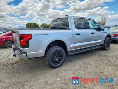 Trzecie zdjęcie samochodu z tyłu: 2025 FORD F150 LIGHTNING XLT VIN:1FTVW3LK6SWG28227 - miniatura
