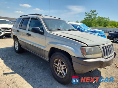 Czwarte zdjęcie samochodu z boku: 2004 JEEP GRAND CHEROKEE LAREDO VIN:1J4GW48S94C310642 - miniatura