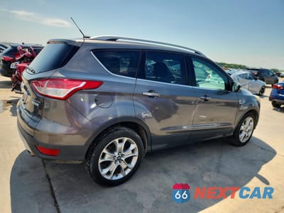 Trzecie zdjęcie samochodu z tyłu: 2014 FORD ESCAPE TITANIUM VIN:1FMCU0JX2EUB44576 - miniatura