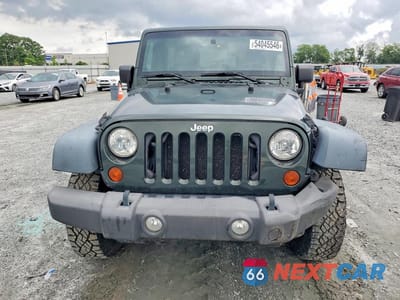 Piąte zdjęcie samochodu w środku: 2010 JEEP WRANGLER UNLIMITED SPORT VIN:1J4BA3H10AL197721 - miniatura