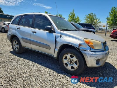 Czwarte zdjęcie samochodu z boku: 2004 TOYOTA RAV4 BASE VIN:JTEGD20V540034379 - miniatura