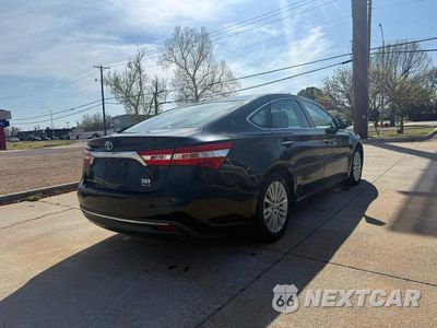 Czwarte zdjęcie samochodu z boku: 2014 TOYOTA AVALON HYBRID XLE PREMIUM VIN:4T1BD1EB7EU021808 - miniatura