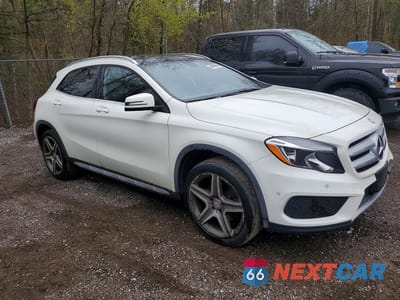 Czwarte zdjęcie samochodu z boku: 2015 MERCEDES-BENZ GLA 250 4MATIC VIN:WDCTG4GB2FJ080468 - miniatura