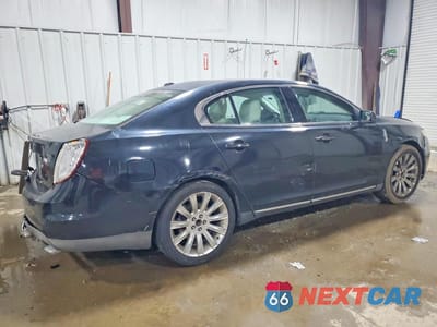 Trzecie zdjęcie samochodu z tyłu: 2009 LINCOLN MKS VIN:1LNHM93R49G612661 - miniatura