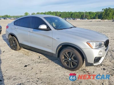 Czwarte zdjęcie samochodu z boku: 2016 BMW X4 XDRIVE28I VIN:5UXXW3C53G0R20087 - miniatura