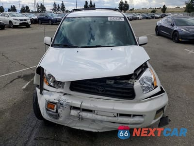 Piąte zdjęcie samochodu w środku: 2002 TOYOTA RAV4 BASE VIN:JTEGH20V320060402 - miniatura