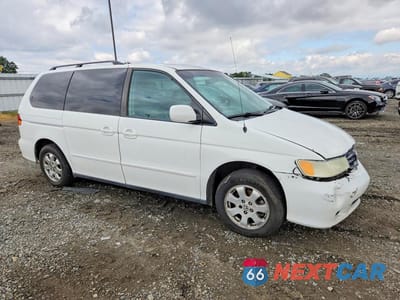 Czwarte zdjęcie samochodu z boku: 2002 HONDA ODYSSEY EXL VIN:5FNRL18962B023861 - miniatura