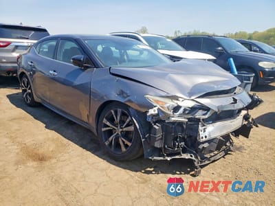 Czwarte zdjęcie samochodu z boku: 2016 NISSAN MAXIMA 3.5 SL VIN:1N4AA6AP1GC441148 - miniatura
