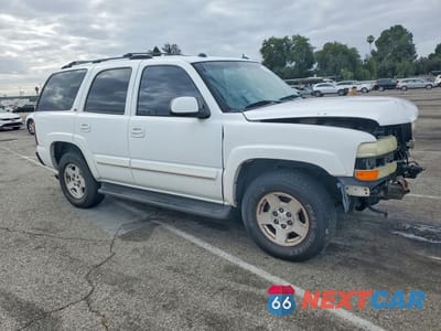 Czwarte zdjęcie samochodu z boku: 2004 CHEVROLET TAHOE C1500 VIN:1GNEC13T24J326219 - miniatura