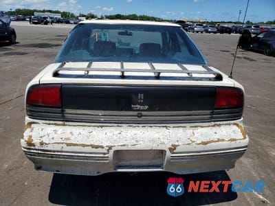 Zdjęcie 6 z 12 samochodu: 1992 OLDSMOBILE CUTLASS SUPREME S VIN:1G3WH54T1ND336907 - miniatura