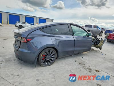 Trzecie zdjęcie samochodu z tyłu: 2023 TESLA MODEL Y VIN:7SAYGDEF7PF874976 - miniatura