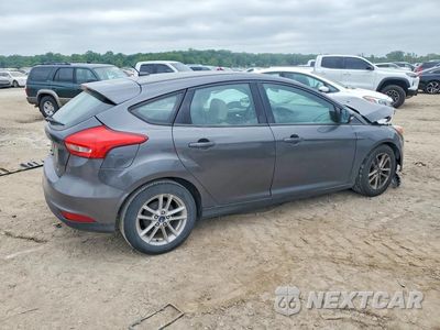 Trzecie zdjęcie samochodu z tyłu: 2017 FORD FOCUS SE VIN:1FADP3K27HL215856 - miniatura