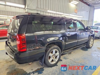 Trzecie zdjęcie samochodu z tyłu: 2012 CHEVROLET SUBURBAN K1500 LTZ VIN:1GNSKKE78CR140342 - miniatura