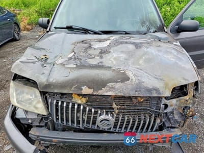 Zdjęcie 11 z 12 samochodu: 2006 MERCURY MARINER VIN:4M2YU57196KJ11365 - miniatura