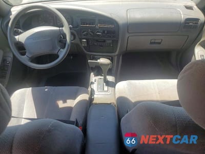 Zdjęcie 8 z 12 samochodu: 1995 TOYOTA CAMRY LE VIN:4T1GK12E2SU079976 - miniatura