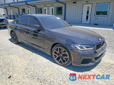 Czwarte zdjęcie samochodu z boku: 2023 BMW 540 XI VIN:WBA73BJ07PWX99005 - miniatura