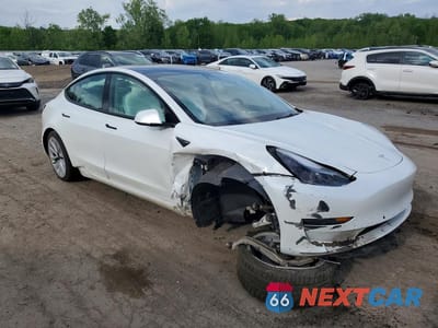 Czwarte zdjęcie samochodu z boku: 2022 TESLA MODEL 3 VIN:5YJ3E1EB7NF254327 - miniatura