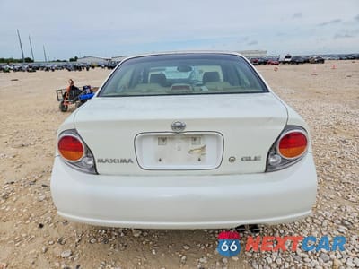 Zdjęcie 6 z 12 samochodu: 2003 NISSAN MAXIMA GXE VIN:JN1DA31A13T439768 - miniatura