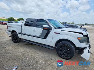 Czwarte zdjęcie samochodu z boku: 2014 FORD F150 SUPERCREW VIN:1FTFW1CT7EFB94633 - miniatura