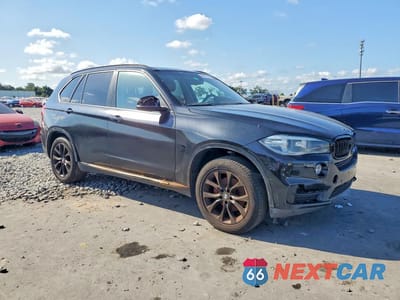 Czwarte zdjęcie samochodu z boku: 2014 BMW X5 XDRIVE35I VIN:5UXKR0C52E0H27784 - miniatura