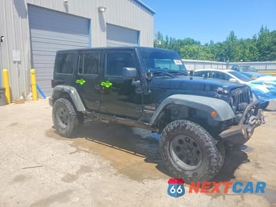 Czwarte zdjęcie samochodu z boku: 2012 JEEP WRANGLER UNLIMITED SPORT VIN:1C4BJWDG6CL119190 - miniatura