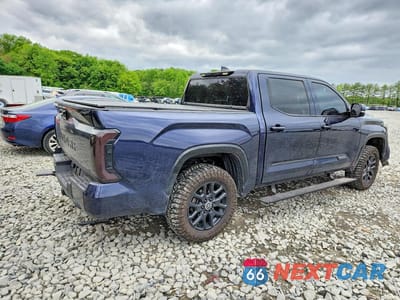 Trzecie zdjęcie samochodu z tyłu: 2024 TOYOTA TUNDRA PLATINUM HV VIN:5TFNC5DB5RX051133 - miniatura