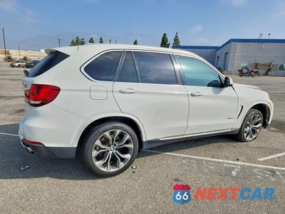 Trzecie zdjęcie samochodu z tyłu: 2014 BMW X5 SDRIVE35I VIN:5UXKR2C57E0H32250 - miniatura