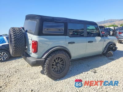 Trzecie zdjęcie samochodu z tyłu: 2022 FORD BRONCO BASE VIN:1FMEE5DP9NLB07366 - miniatura