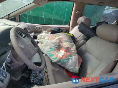 Zdjęcie 7 z 13 samochodu: 2002 TOYOTA SIENNA XLE VIN:4T3ZF13C42U477742 - miniatura