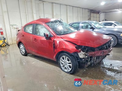 Czwarte zdjęcie samochodu z boku: 2018 TOYOTA YARIS IA BASE VIN:3MYDLBYV2JY317419 - miniatura