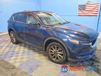 Czwarte zdjęcie samochodu z boku: 2021 MAZDA CX-5 GRAND TOURING VIN:JM3KFADM6M0333973 - miniatura