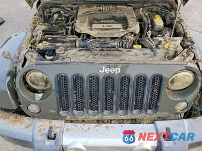 Zdjęcie 11 z 12 samochodu: 2015 JEEP WRANGLER UNLIMITED SAHARA VIN:1C4BJWEG7FL708770 - miniatura