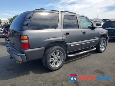 Trzecie zdjęcie samochodu z tyłu: 2002 CHEVROLET TAHOE K1500 VIN:1GNEK13T52J248499 - miniatura