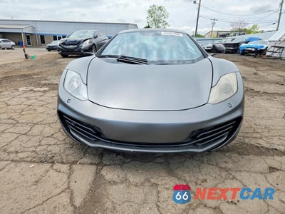 Piąte zdjęcie samochodu w środku: 2012 MCLAREN MP4-12C VIN:SBM11AAAXCW000238 - miniatura