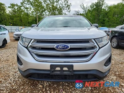 Piąte zdjęcie samochodu w środku: 2015 FORD EDGE SE VIN:2FMTK3G95FBC33064 - miniatura