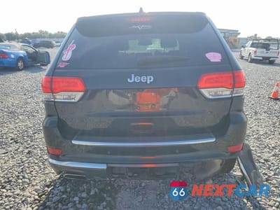 Zdjęcie 6 z 13 samochodu: 2014 JEEP GRAND CHEROKEE SUMMIT VIN:1C4RJEJT7EC438014 - miniatura