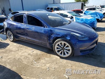Czwarte zdjęcie samochodu z boku: 2022 TESLA MODEL 3 VIN:5YJ3E1EA2NF190883 - miniatura