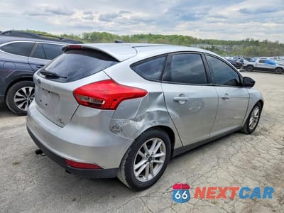 Trzecie zdjęcie samochodu z tyłu: 2016 FORD FOCUS SE VIN:1FADP3K24GL242222 - miniatura
