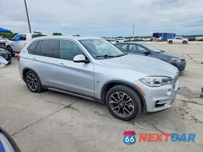 Czwarte zdjęcie samochodu z boku: 2018 BMW X5 XDR40E VIN:5UXKT0C52J0W00459 - miniatura