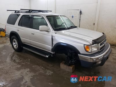 Czwarte zdjęcie samochodu z boku: 1999 TOYOTA 4RUNNER SR5 VIN:JT3HN86R9X0221488 - miniatura