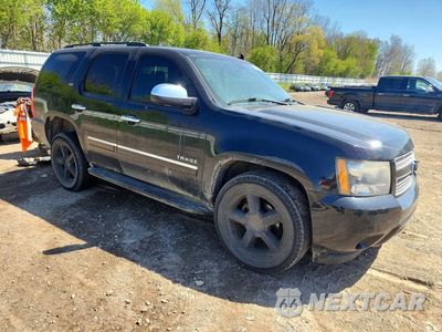 Czwarte zdjęcie samochodu z boku: 2011 CHEVROLET TAHOE K1500 LTZ VIN:1GNSKCE05BR206594 - miniatura