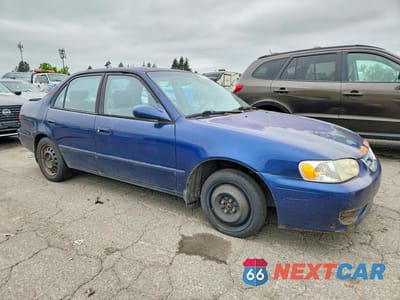Czwarte zdjęcie samochodu z boku: 2002 TOYOTA COROLLA LE VIN:1NXBR12E72Z644857 - miniatura