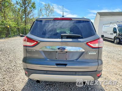 Zdjęcie 6 z 13 samochodu: 2014 FORD ESCAPE TITANIUM VIN:1FMCU0JX8EUC16574 - miniatura