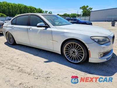 Czwarte zdjęcie samochodu z boku: 2013 BMW 750 LI VIN:WBAYE8C56DDS15968 - miniatura