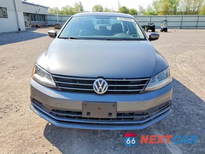 Piąte zdjęcie samochodu w środku: 2017 VOLKSWAGEN JETTA S VIN:3VW2B7AJ2HM266774 - miniatura