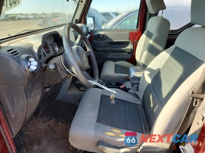 Zdjęcie 7 z 12 samochodu: 2010 JEEP WRANGLER SPORT VIN:1J4AA2D14AL155189 - miniatura