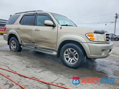 Czwarte zdjęcie samochodu z boku: 2004 TOYOTA SEQUOIA SR5 VIN:5TDBT44AX4S233302 - miniatura
