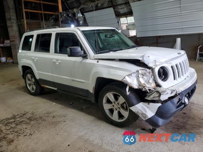 Czwarte zdjęcie samochodu z boku: 2014 JEEP PATRIOT SPORT VIN:1C4NJRBB4ED644736 - miniatura
