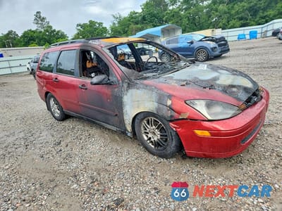 Czwarte zdjęcie samochodu z boku: 2002 FORD FOCUS SE VIN:1FAFP36362W226901 - miniatura